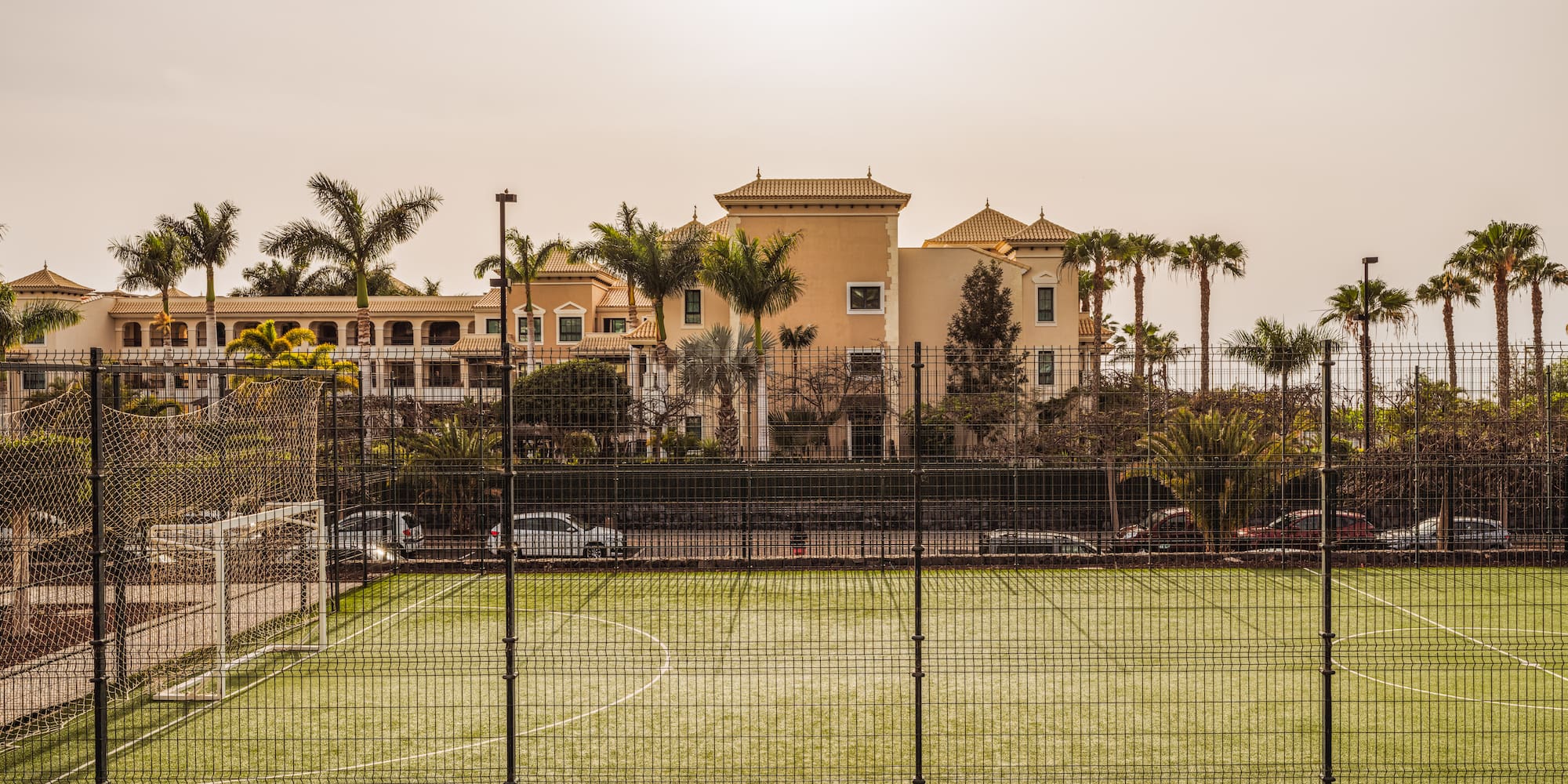 a football field with a fence around it