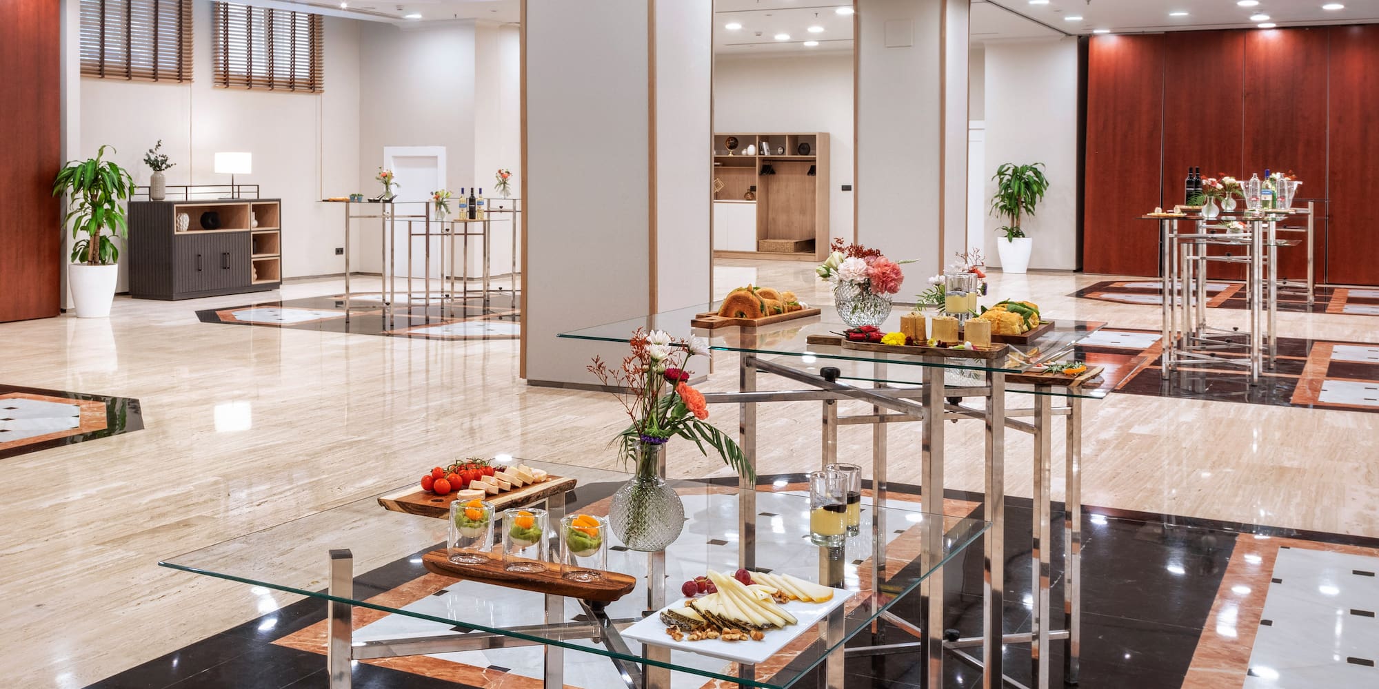 a room with a glass table with food on it