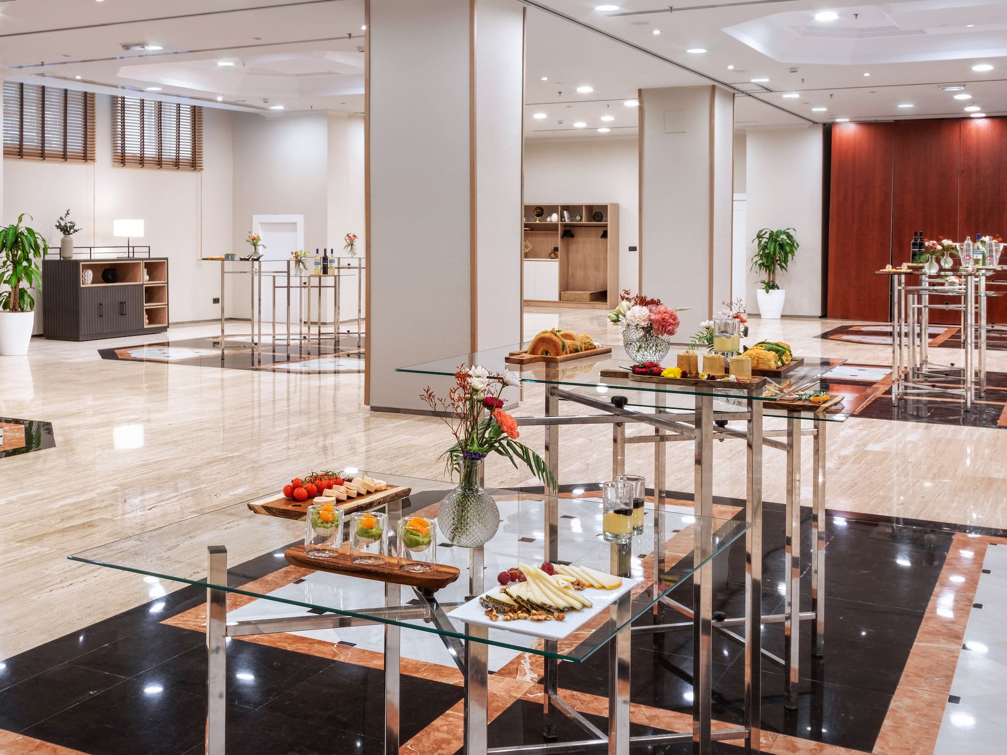 a room with a glass table with food on it