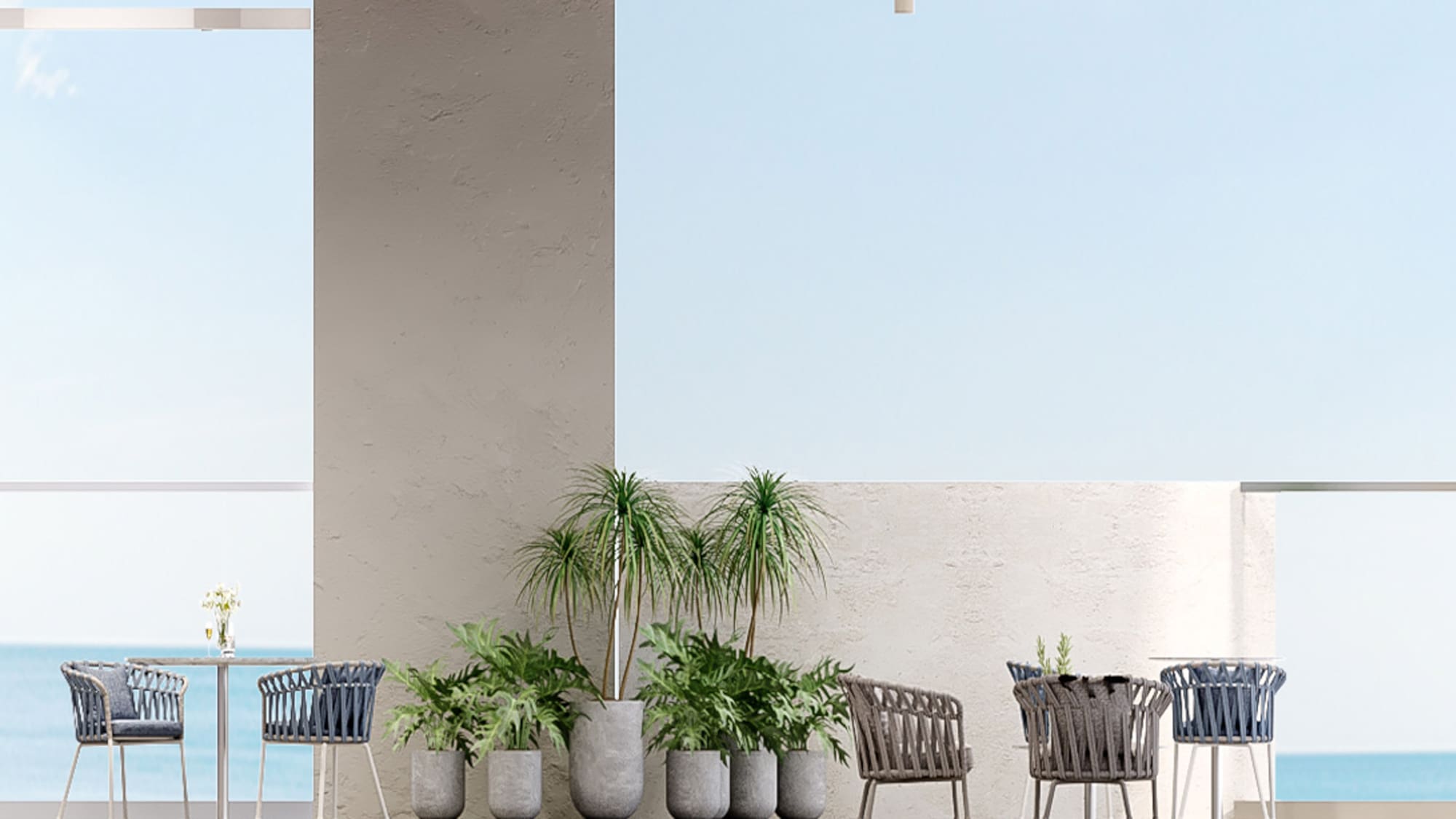 a patio with chairs and tables and plants