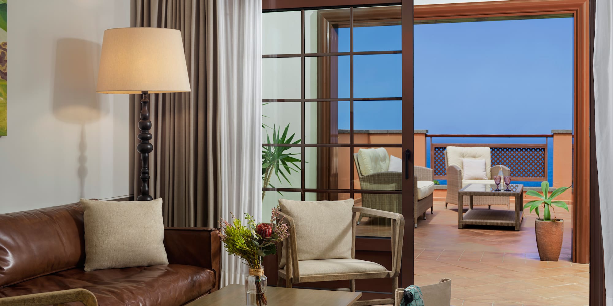 a living room with a couch and a table