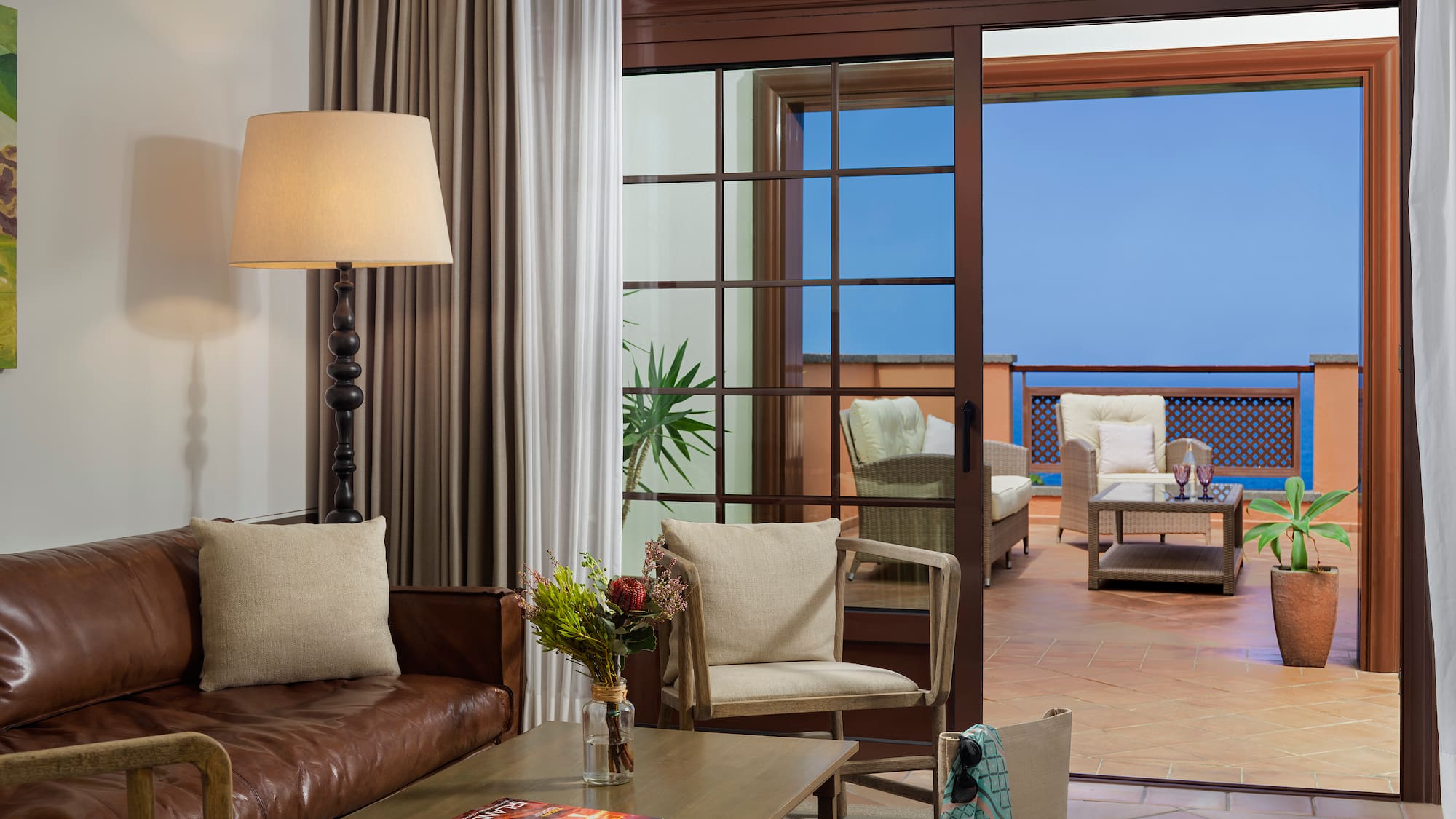 a living room with a couch and a table