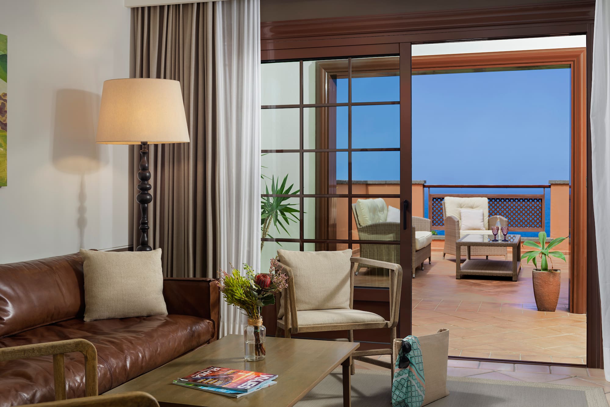 a living room with a couch and a table