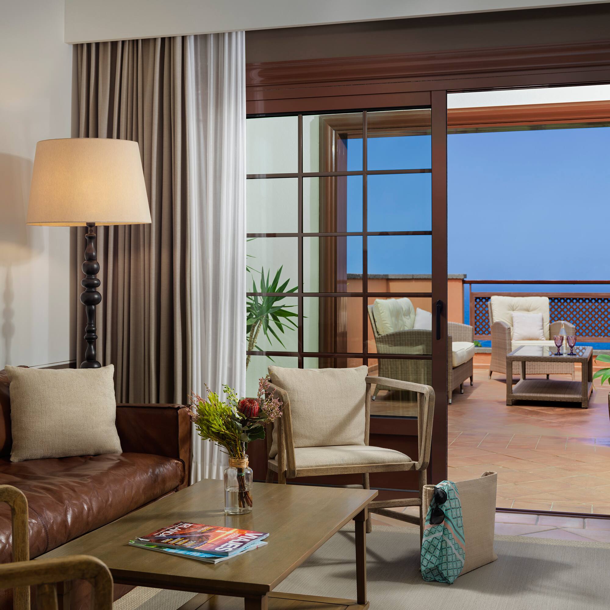 a living room with a couch and a table