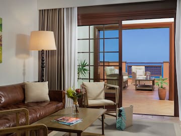 a living room with a couch and a table