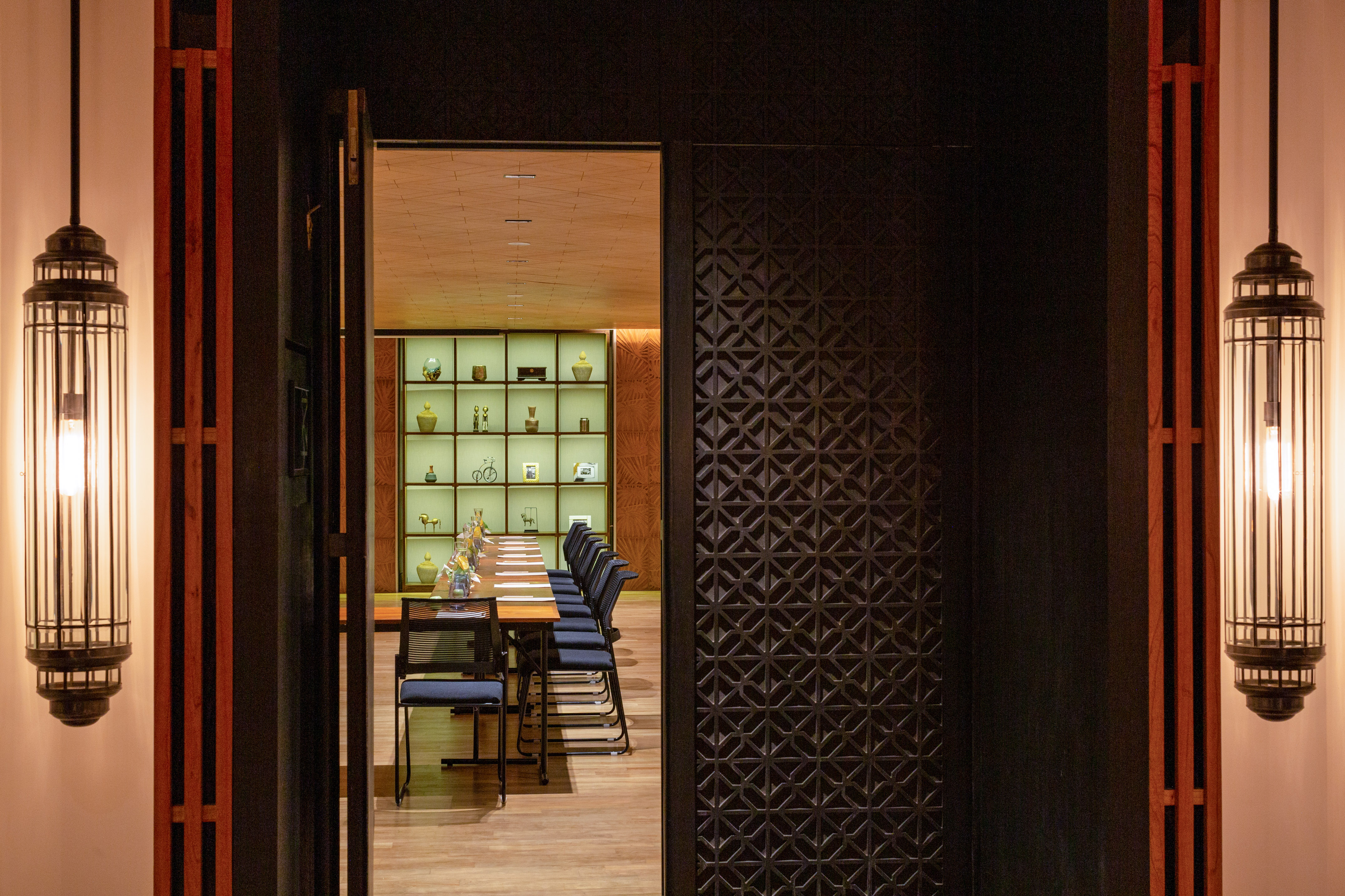 a room with a table and chairs