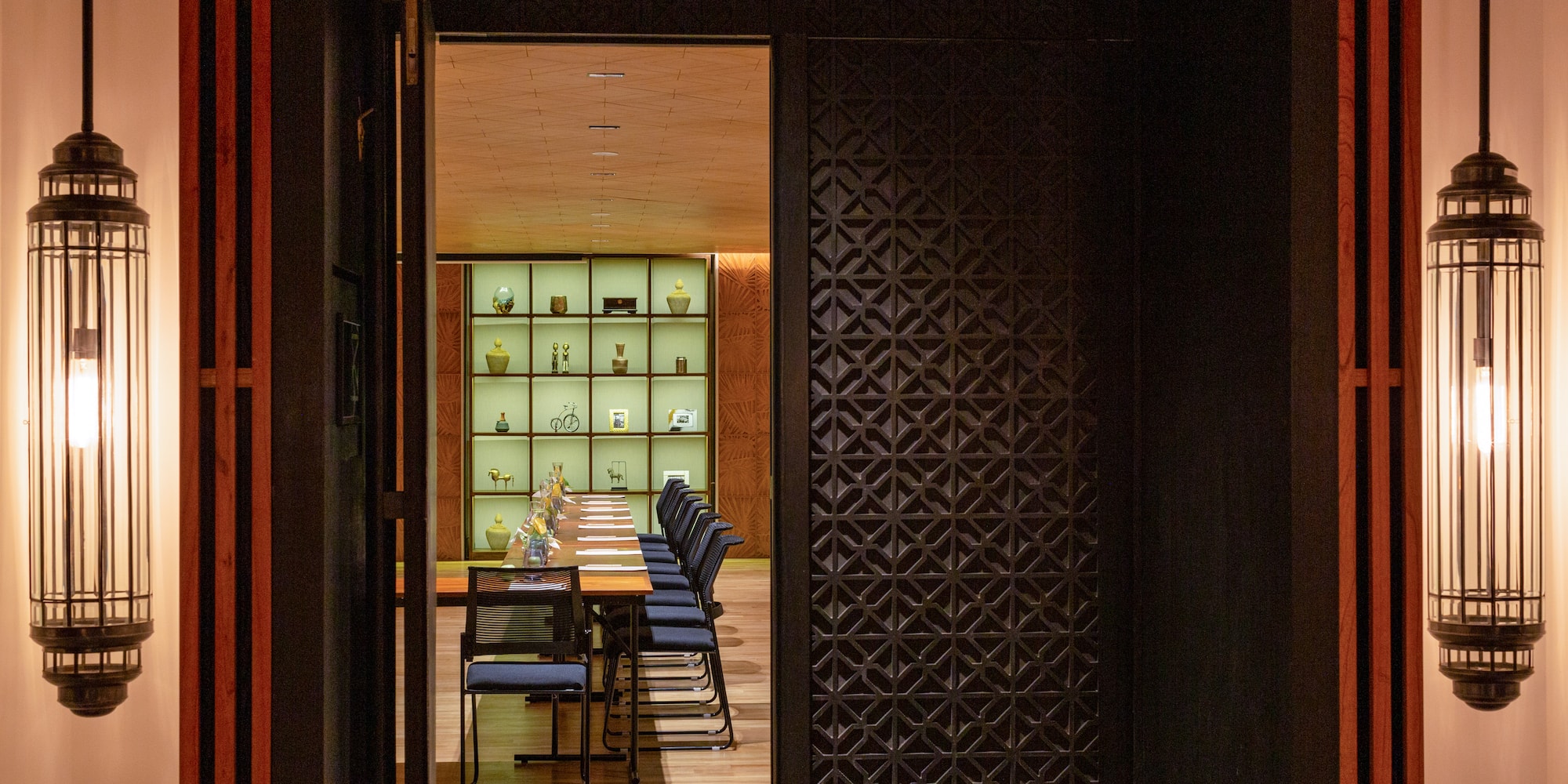 a room with a table and chairs