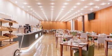 a room with tables and chairs