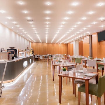 a room with tables and chairs