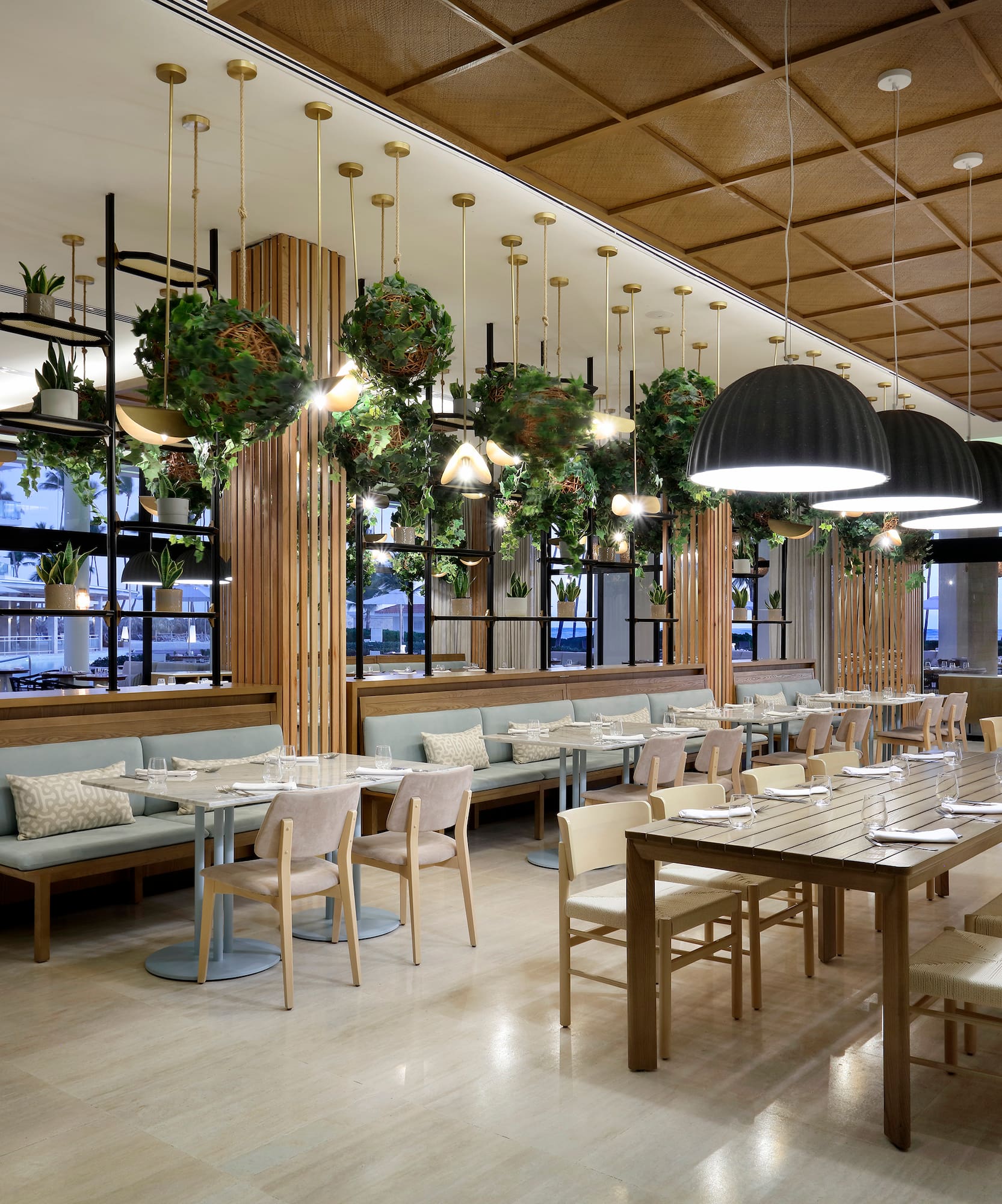 a restaurant with tables and chairs