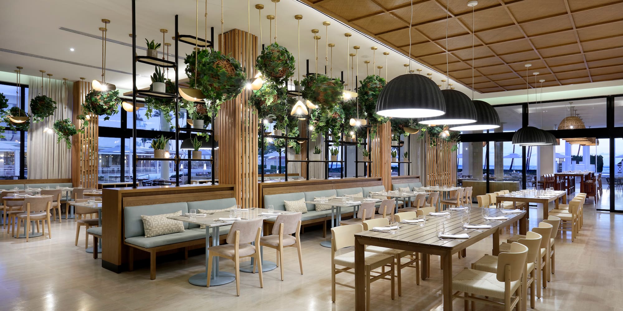 a restaurant with tables and chairs