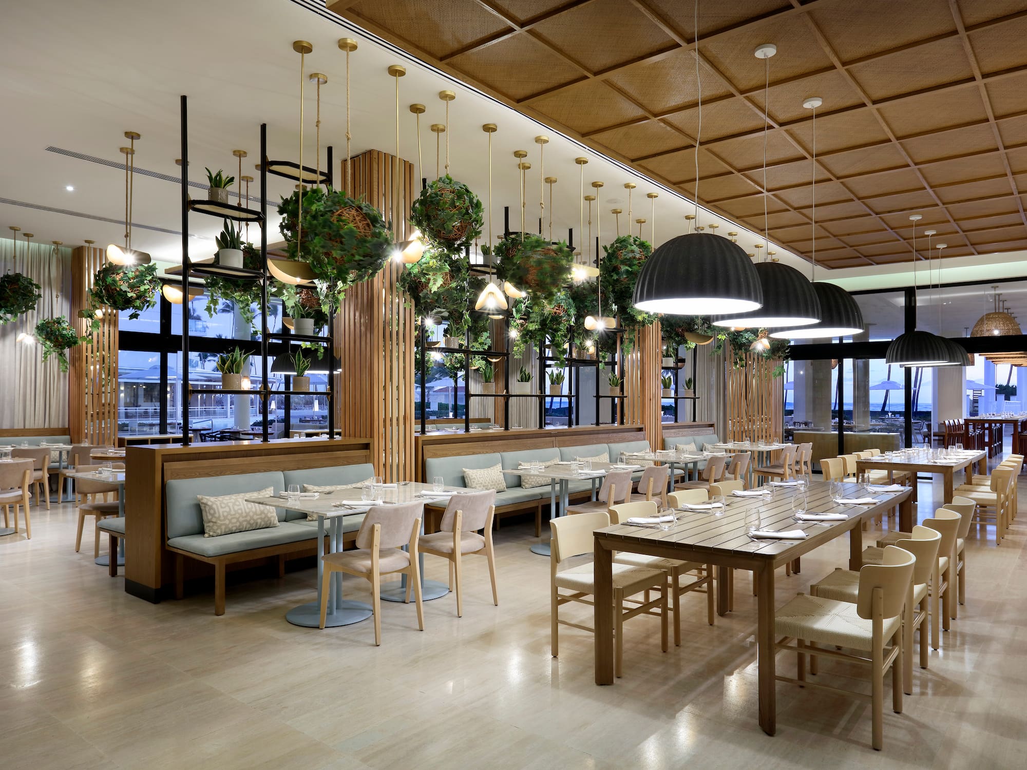 a restaurant with tables and chairs