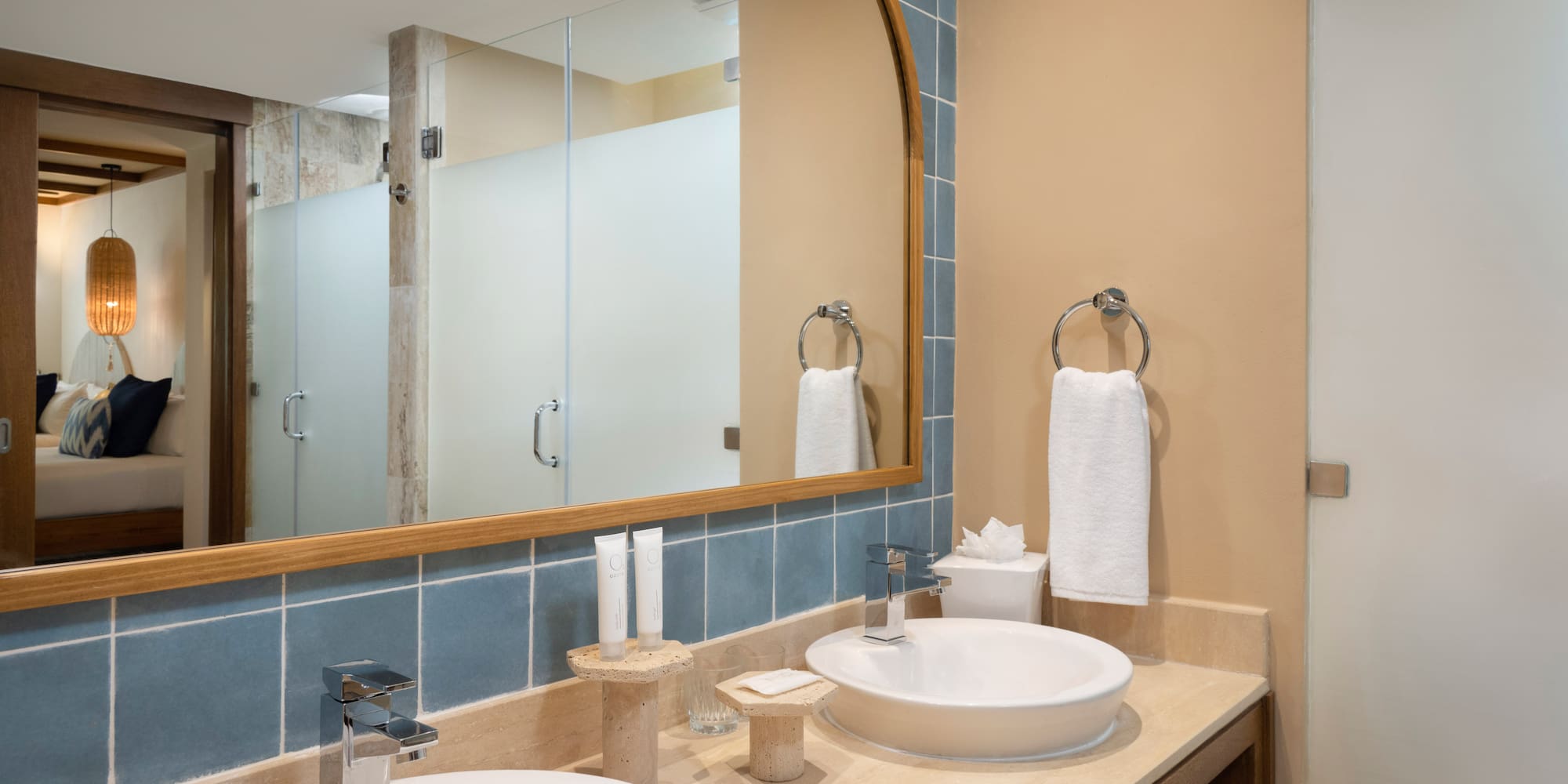 a bathroom with a mirror and sink