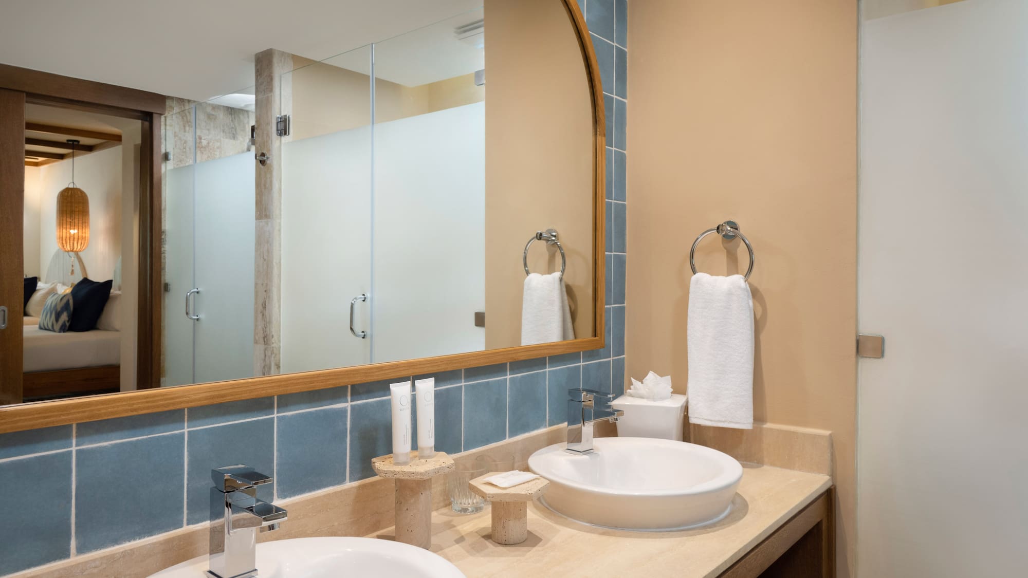 a bathroom with a mirror and sink