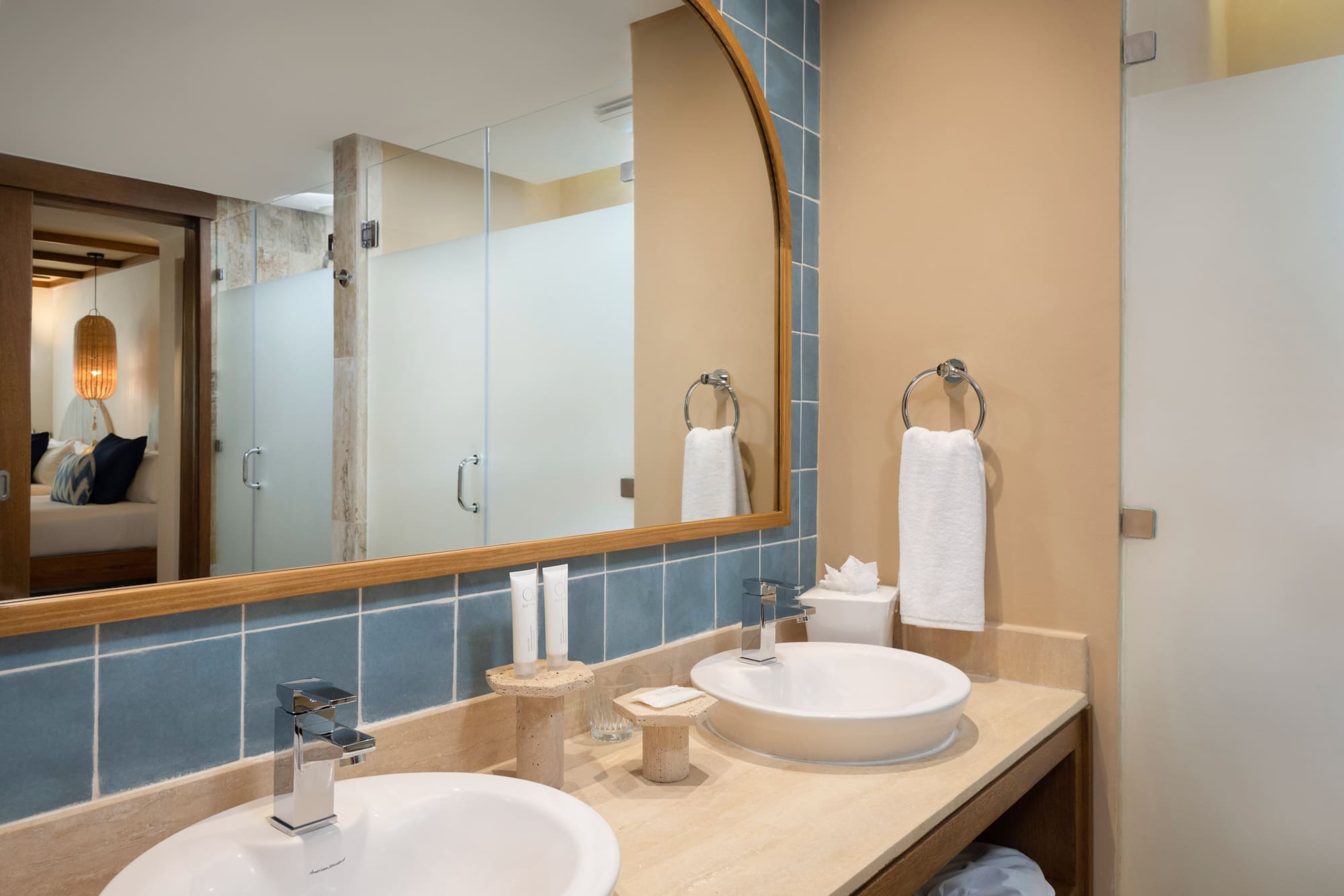 a bathroom with a mirror and sink