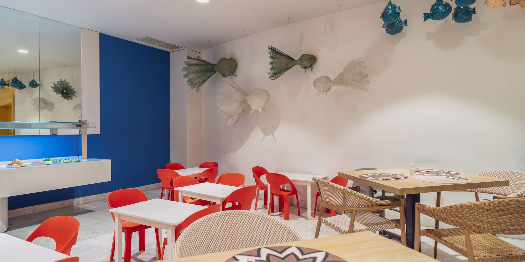 a room with tables and chairs