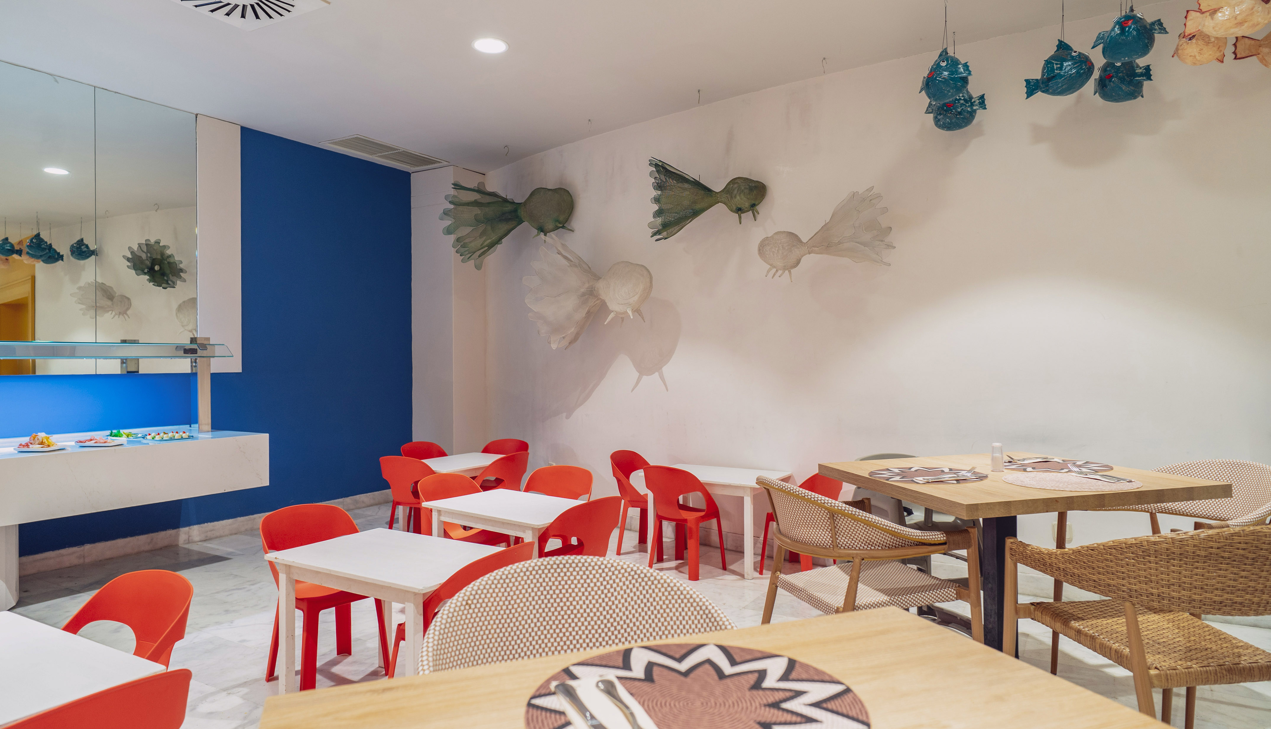 a room with tables and chairs