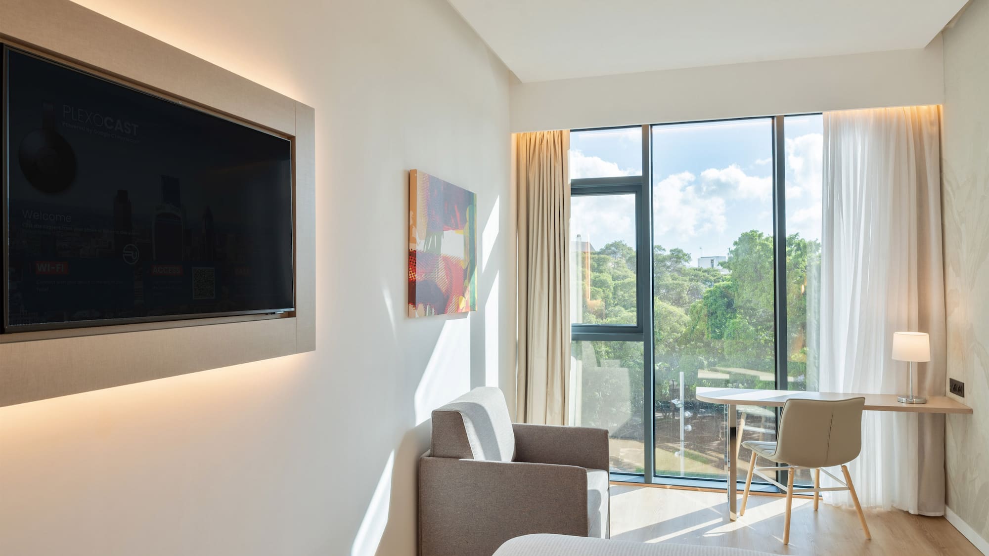 a room with a tv and a table