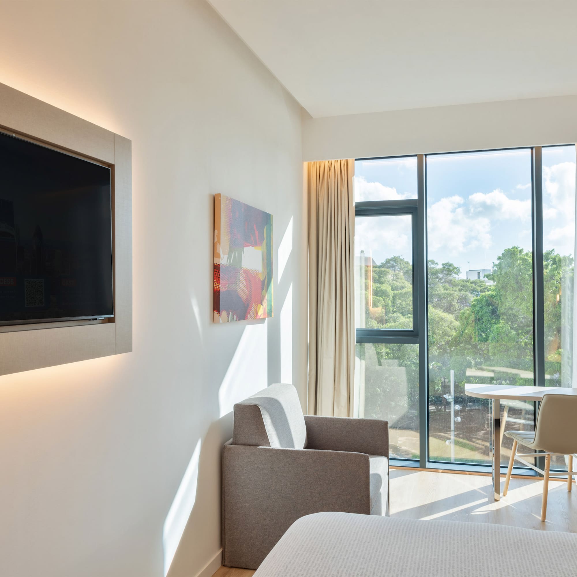 a room with a tv and a table