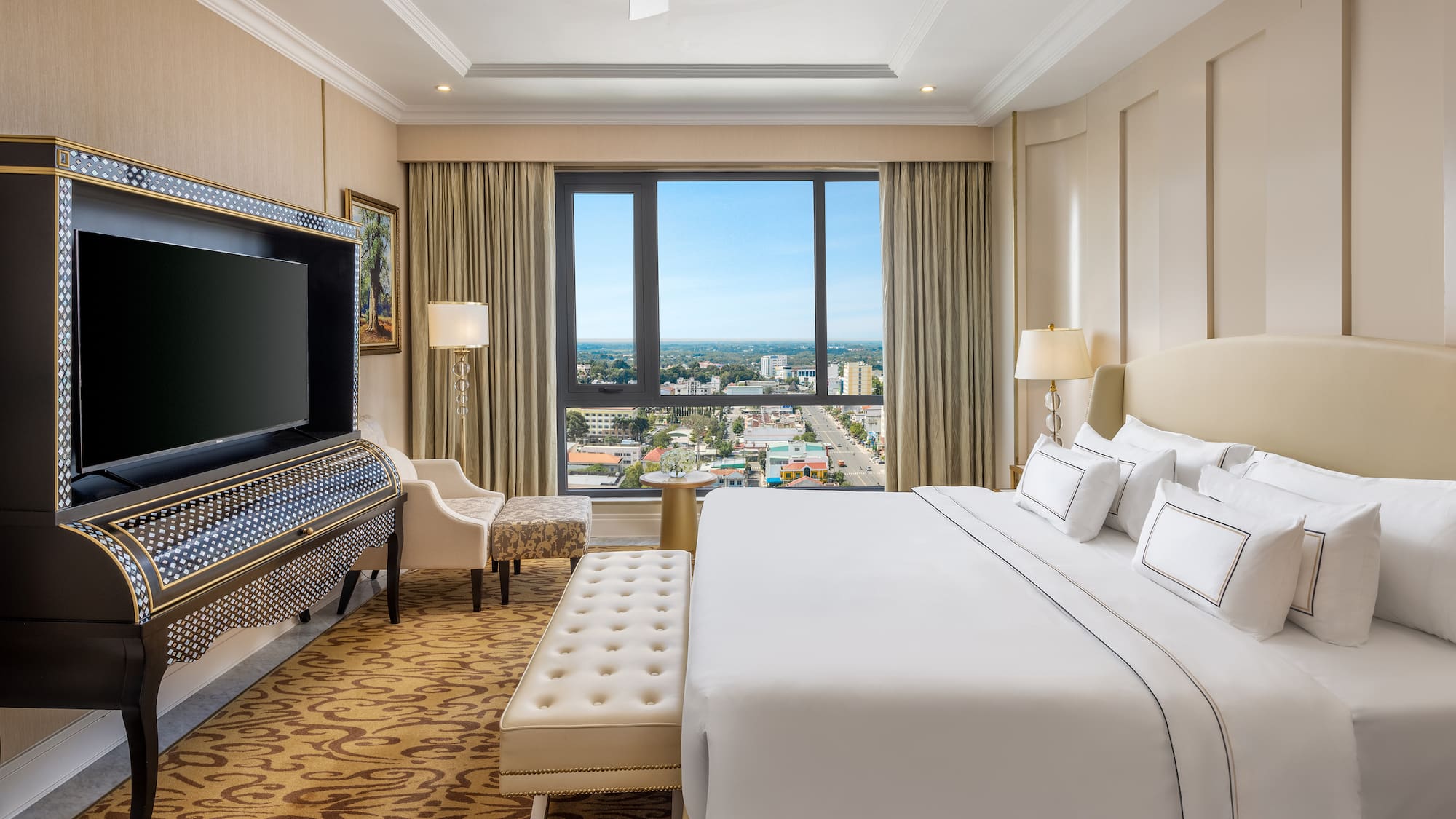 a room with a large bed and a piano