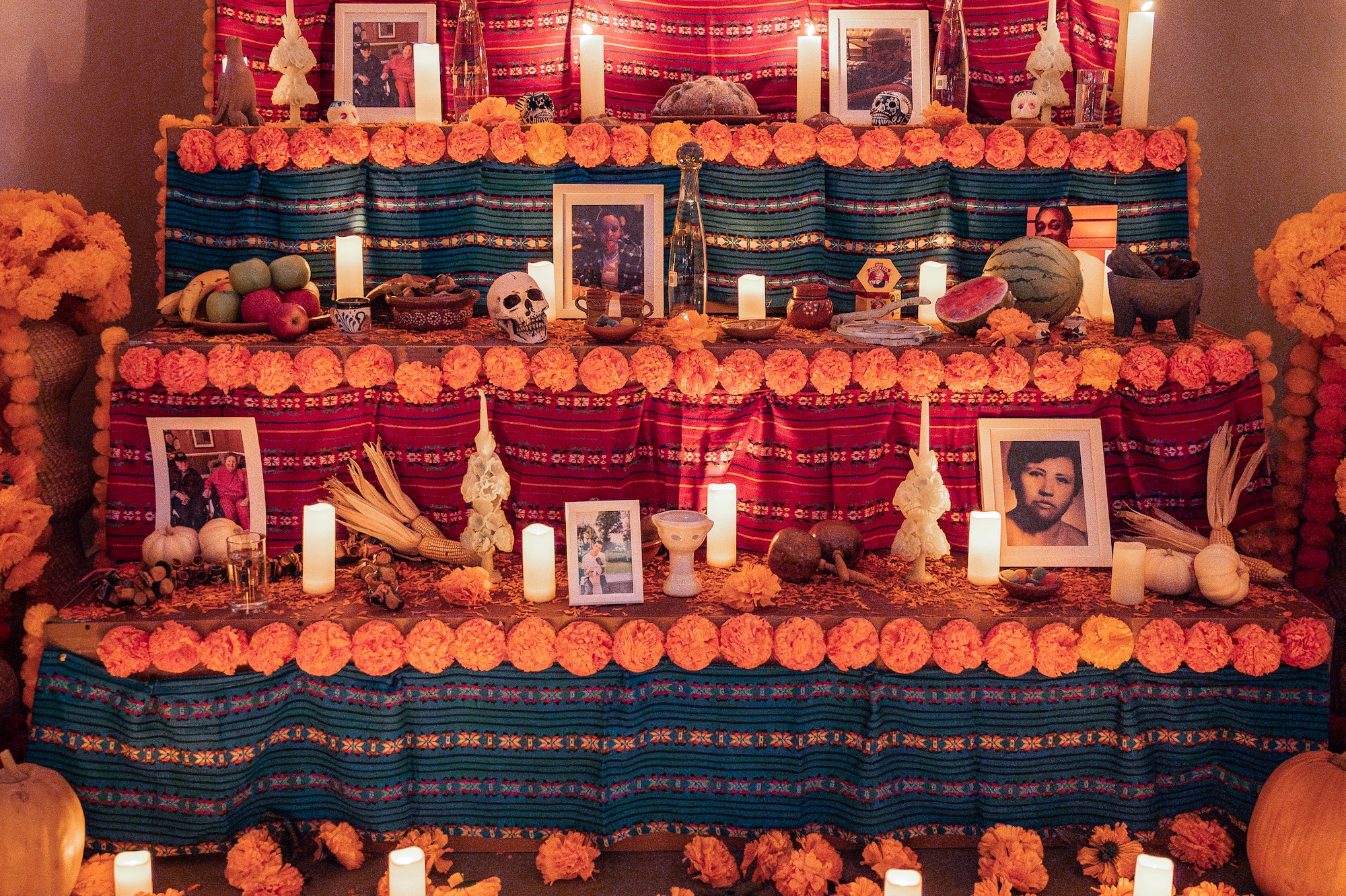 a staircase with flowers and candles
