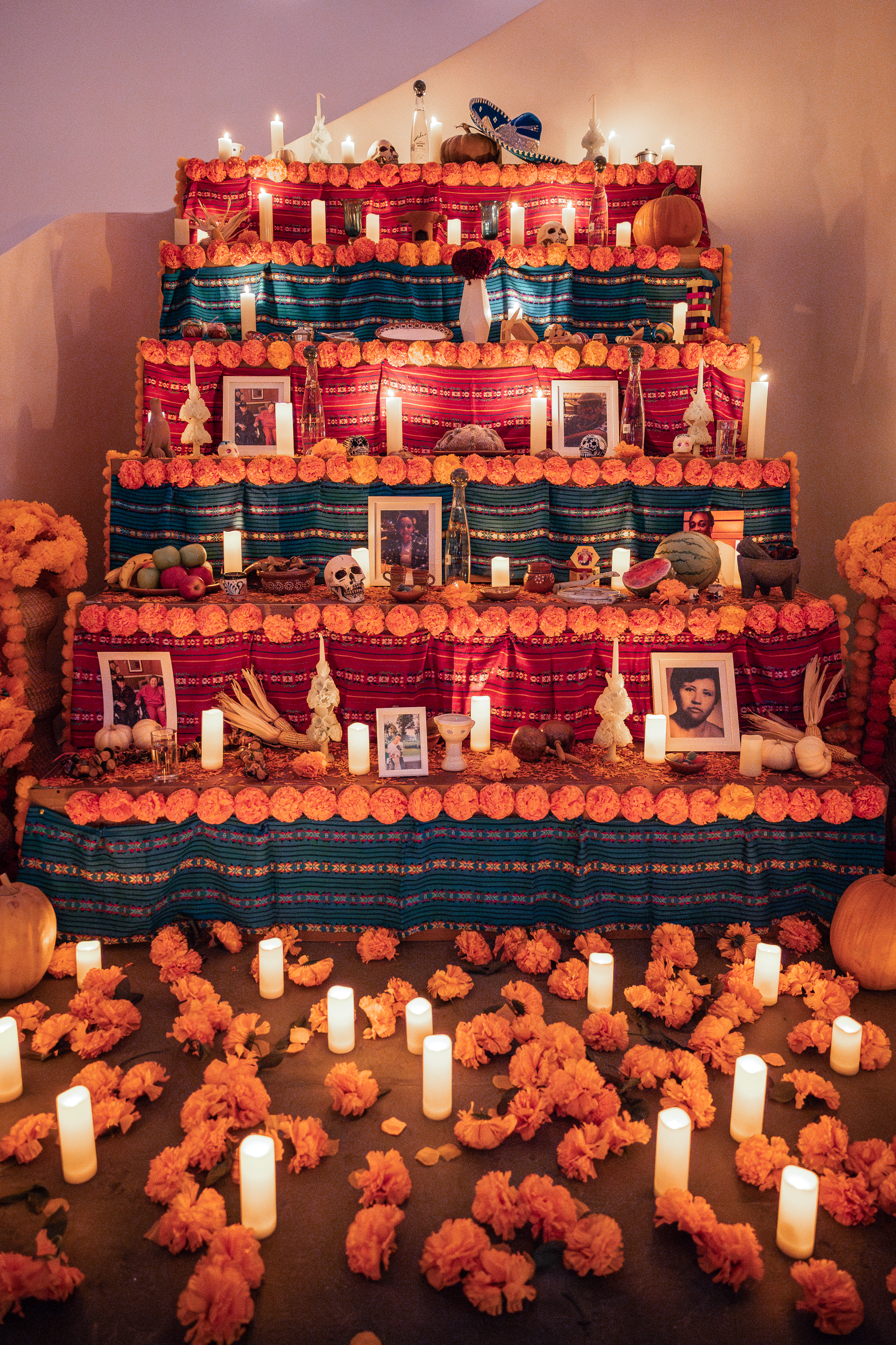 a staircase with flowers and candles