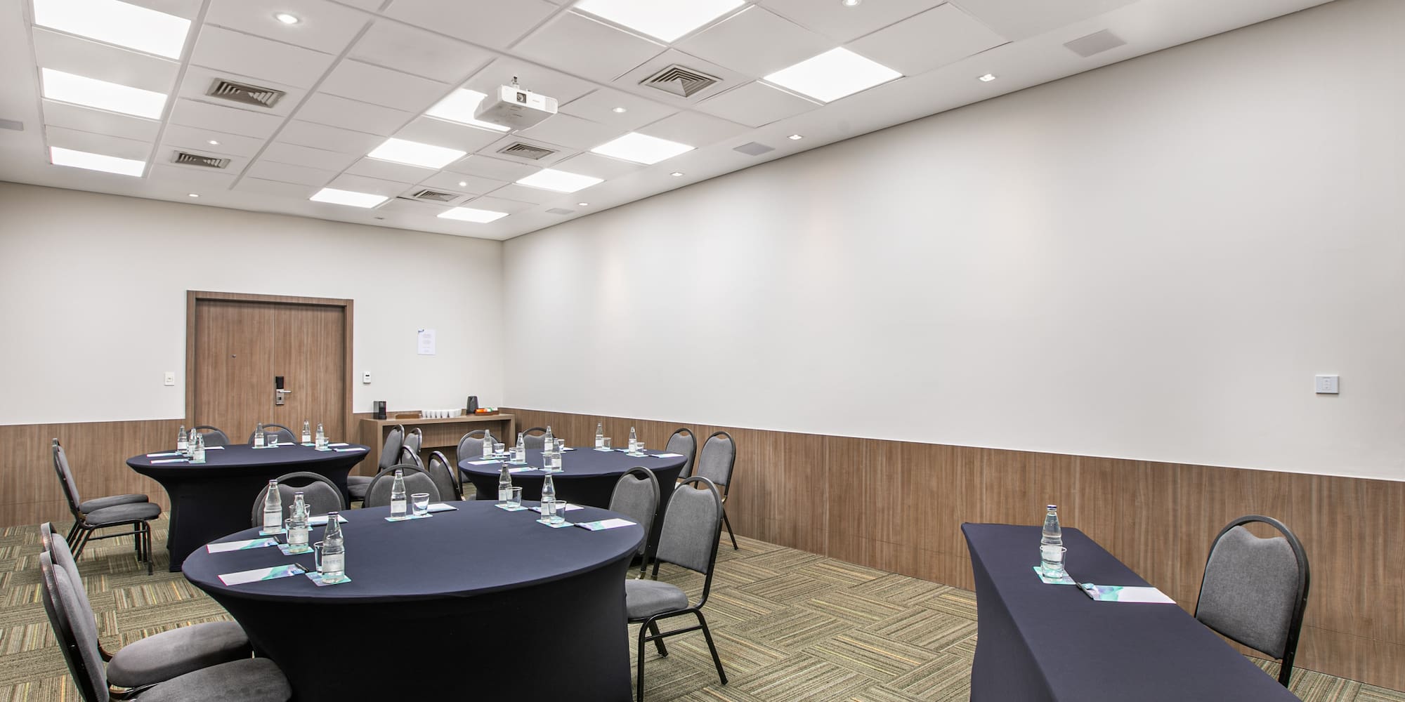 a room with tables and chairs