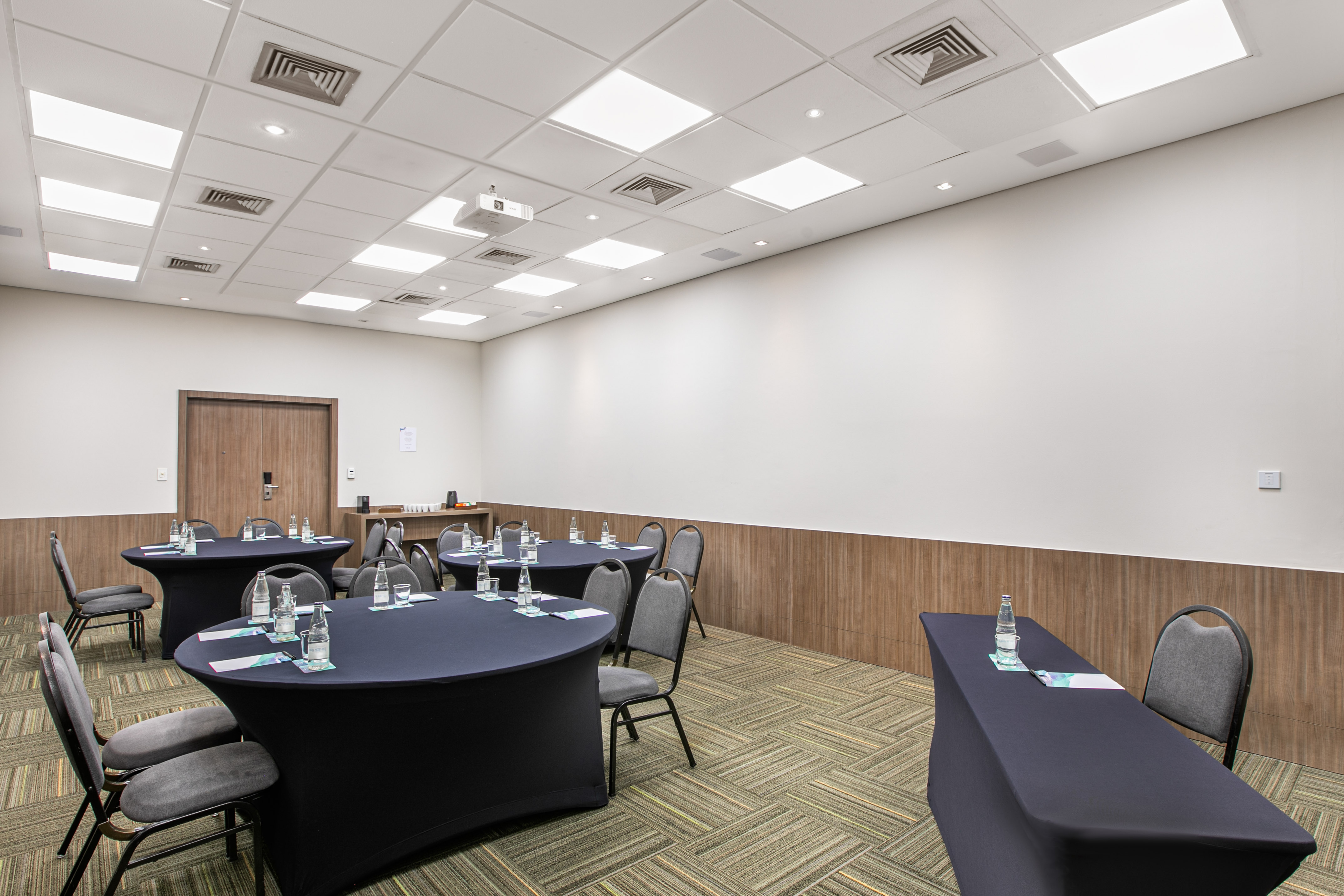a room with tables and chairs