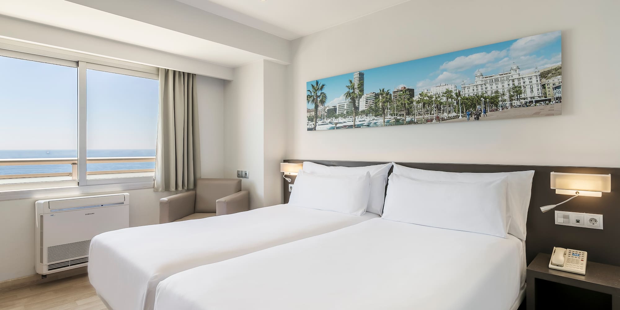 a hotel room with two beds