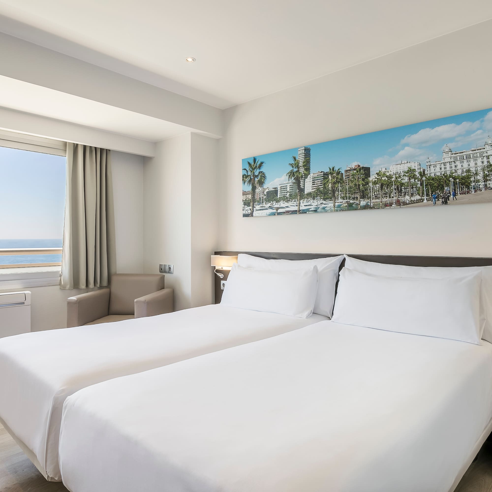 a hotel room with two beds