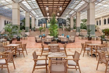 a room with tables and chairs