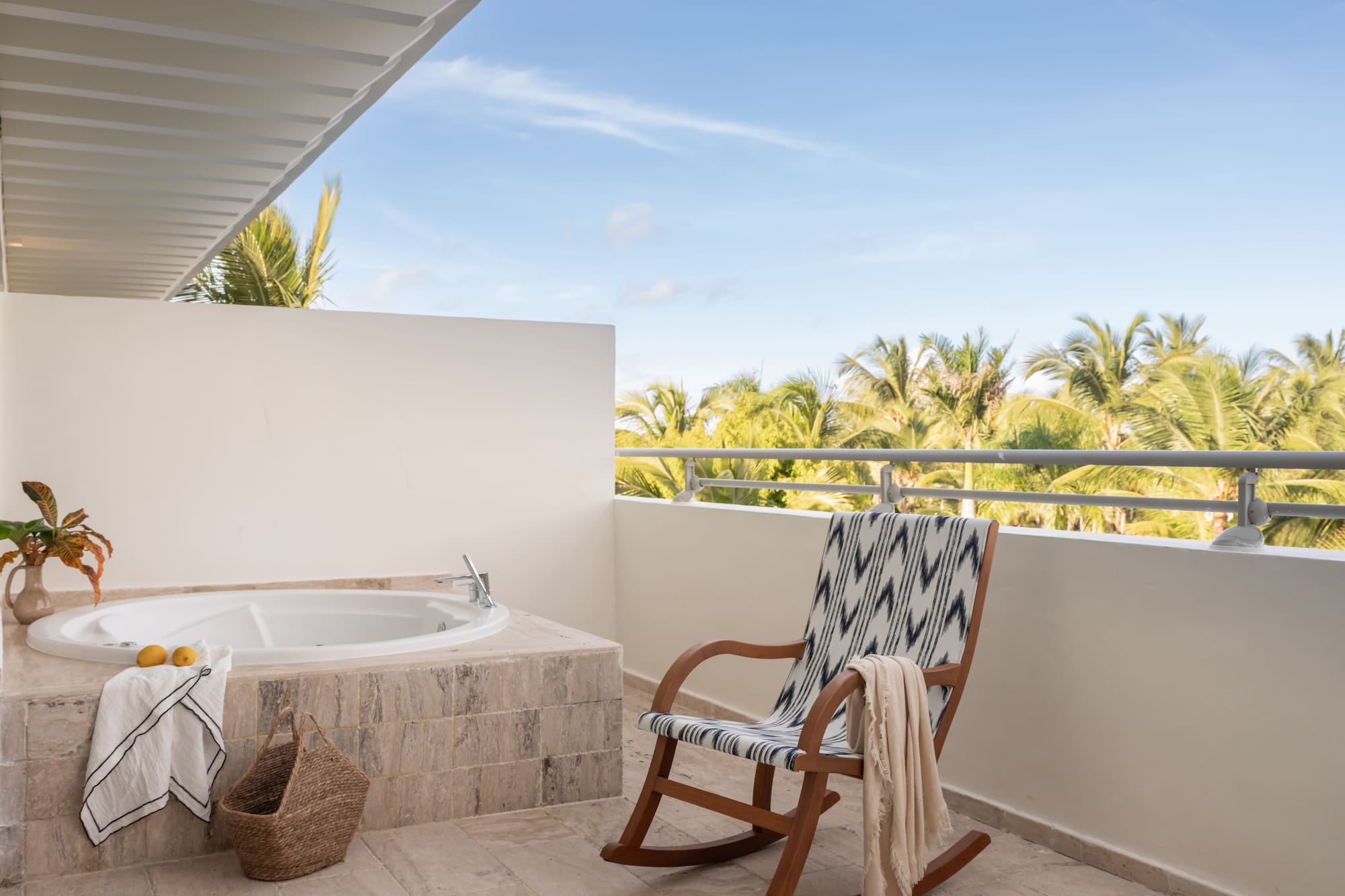 a chair next to a jacuzzi