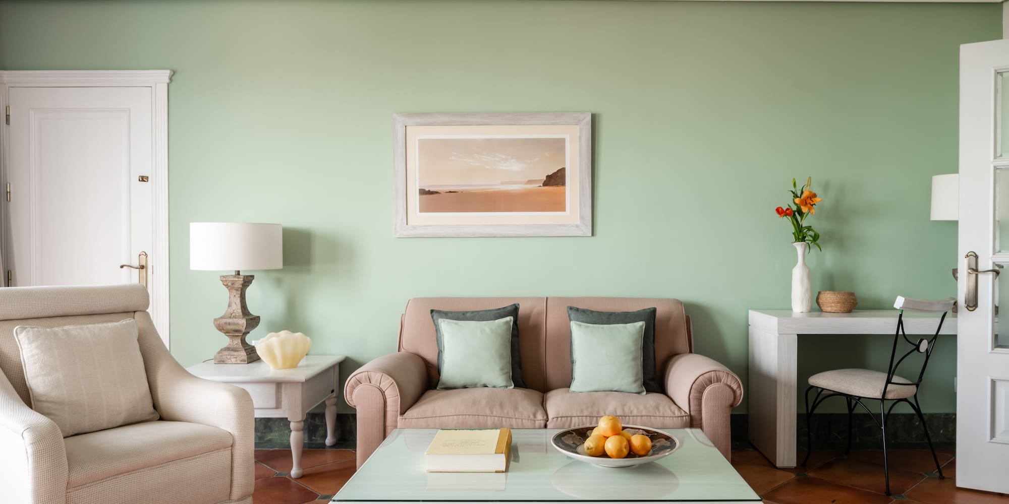 a living room with a couch and coffee table