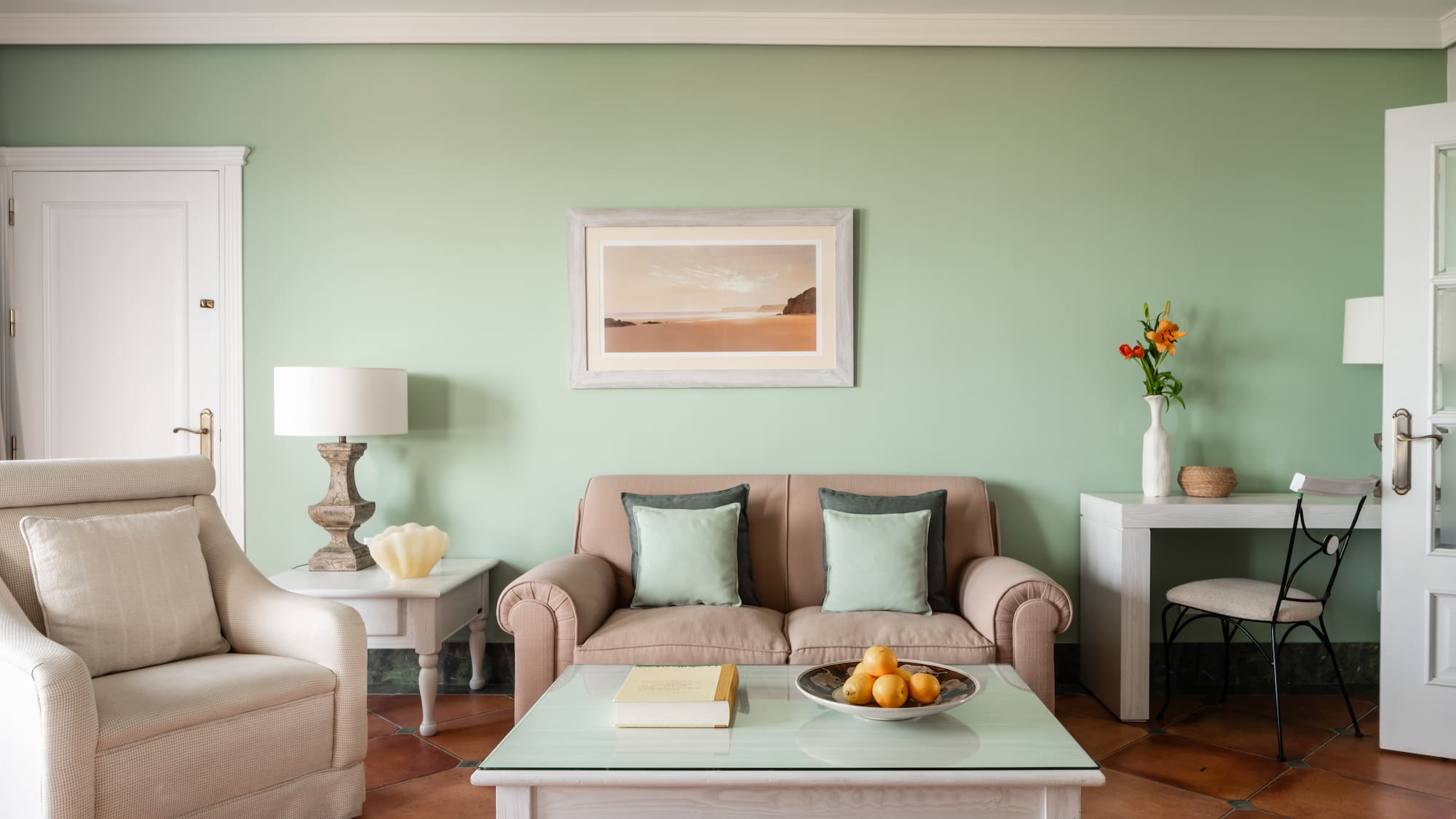 a living room with a couch and coffee table