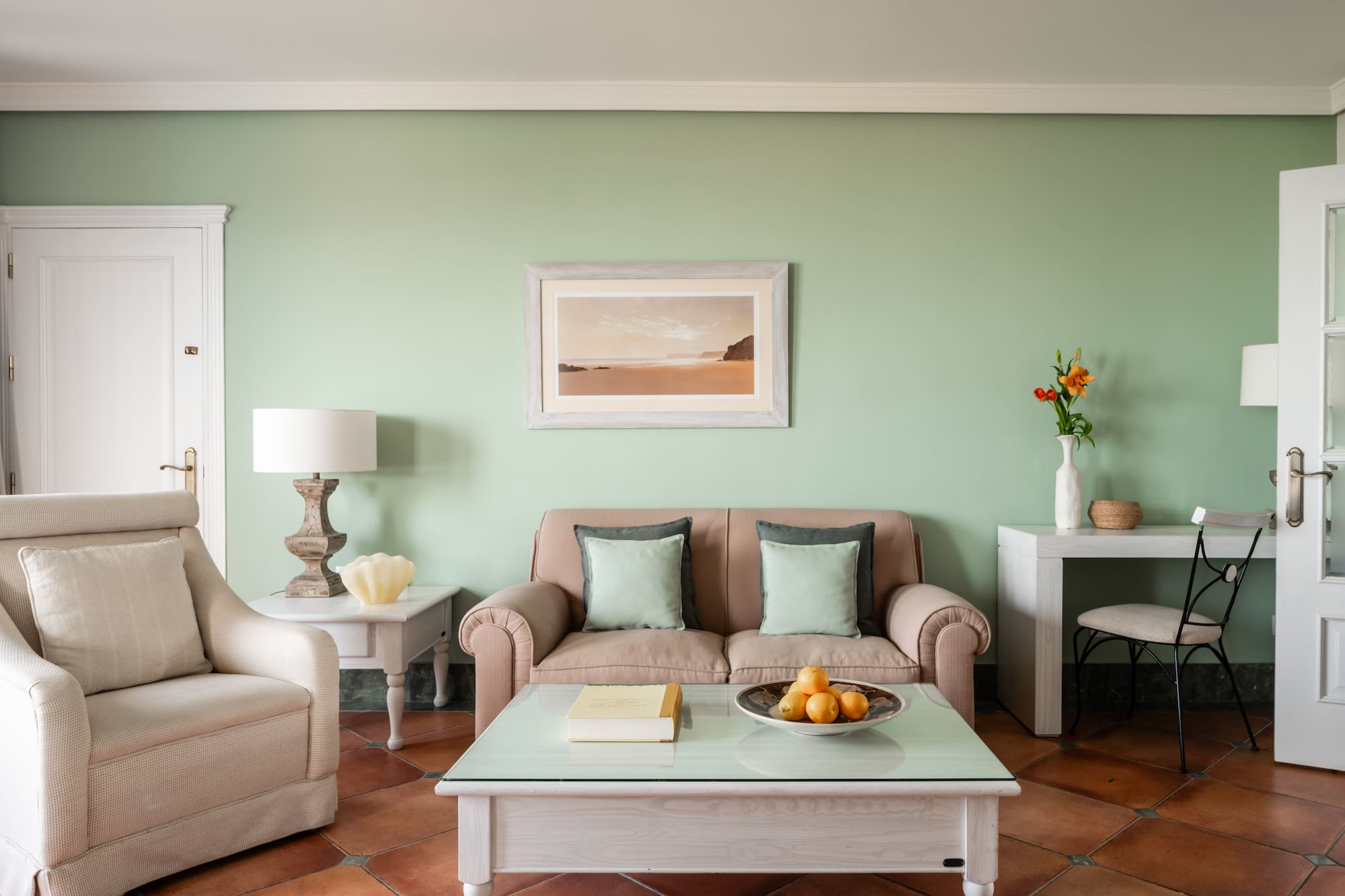 a living room with a couch and coffee table