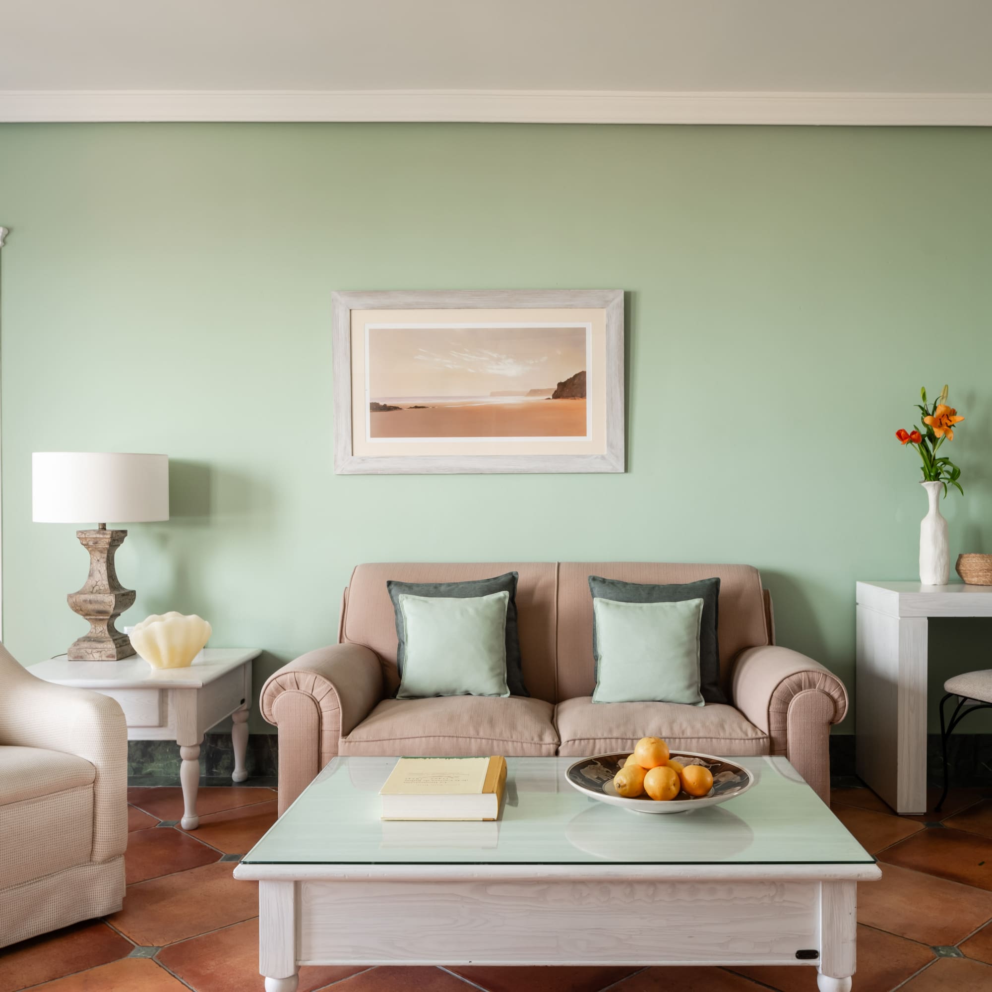 a living room with a couch and coffee table