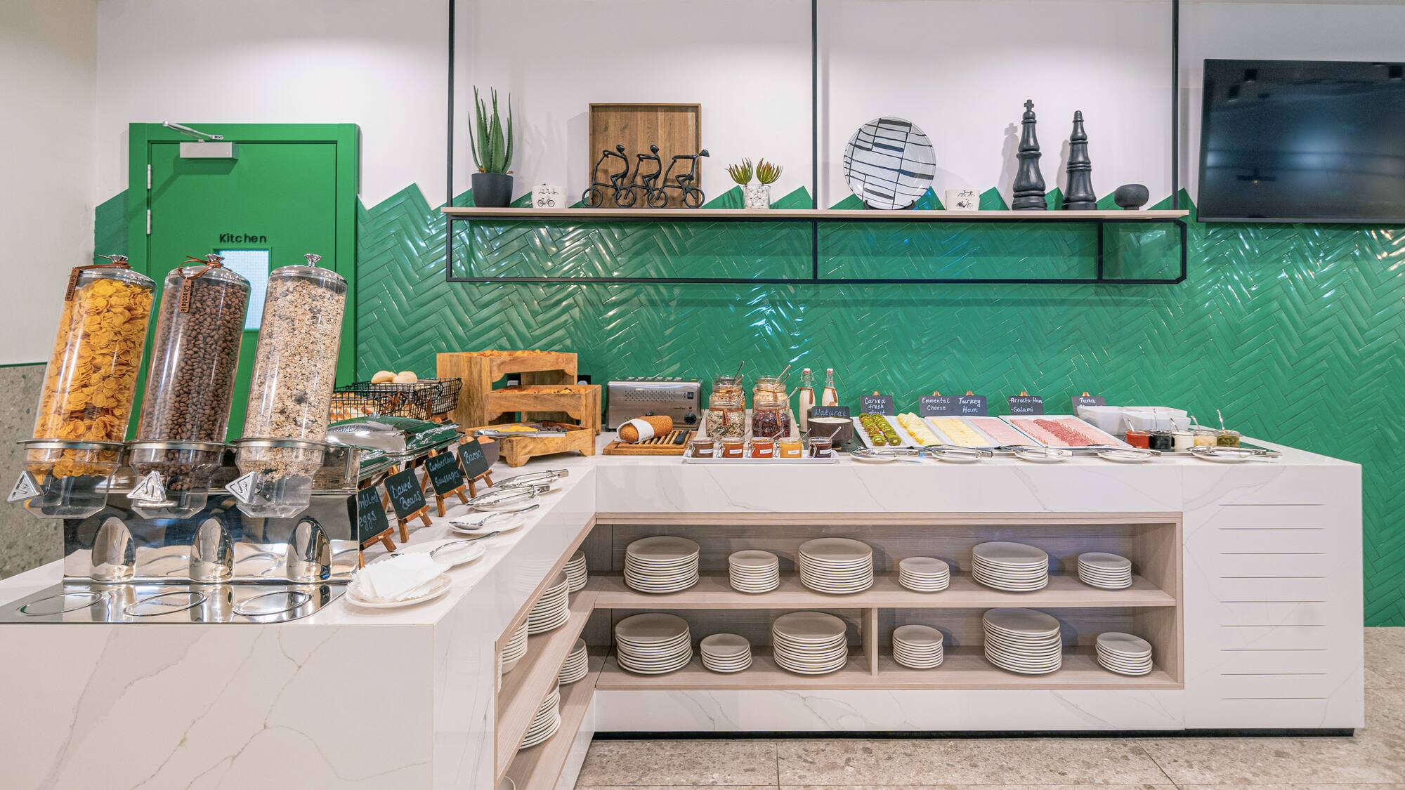 a counter with plates and bowls on it