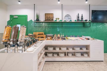 a counter with plates and plates on it