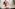 Woman in yoga pose, hands on chest and abdomen for mindful breathing.