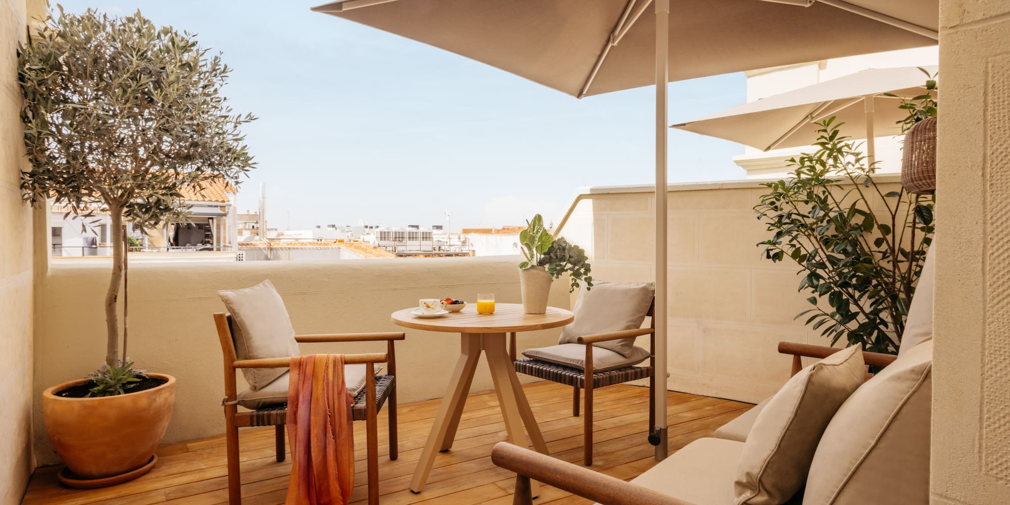 a patio with a table and chairs