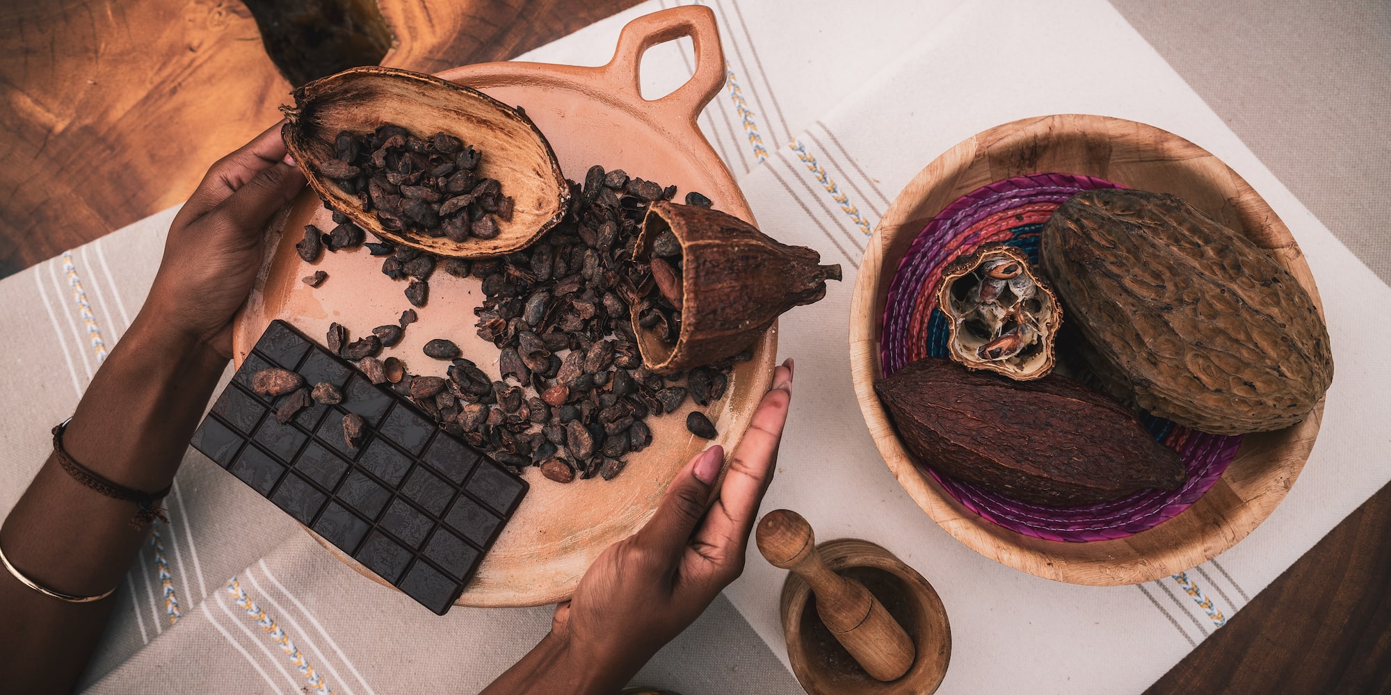 a person holding a plate of food