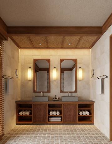 a bathroom with a double sink and mirrors