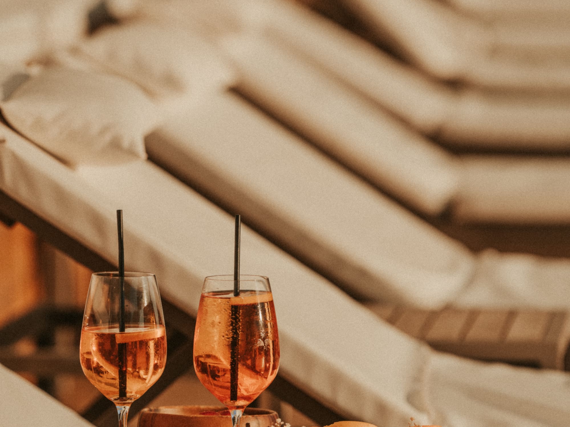 a table with drinks and fruit on it