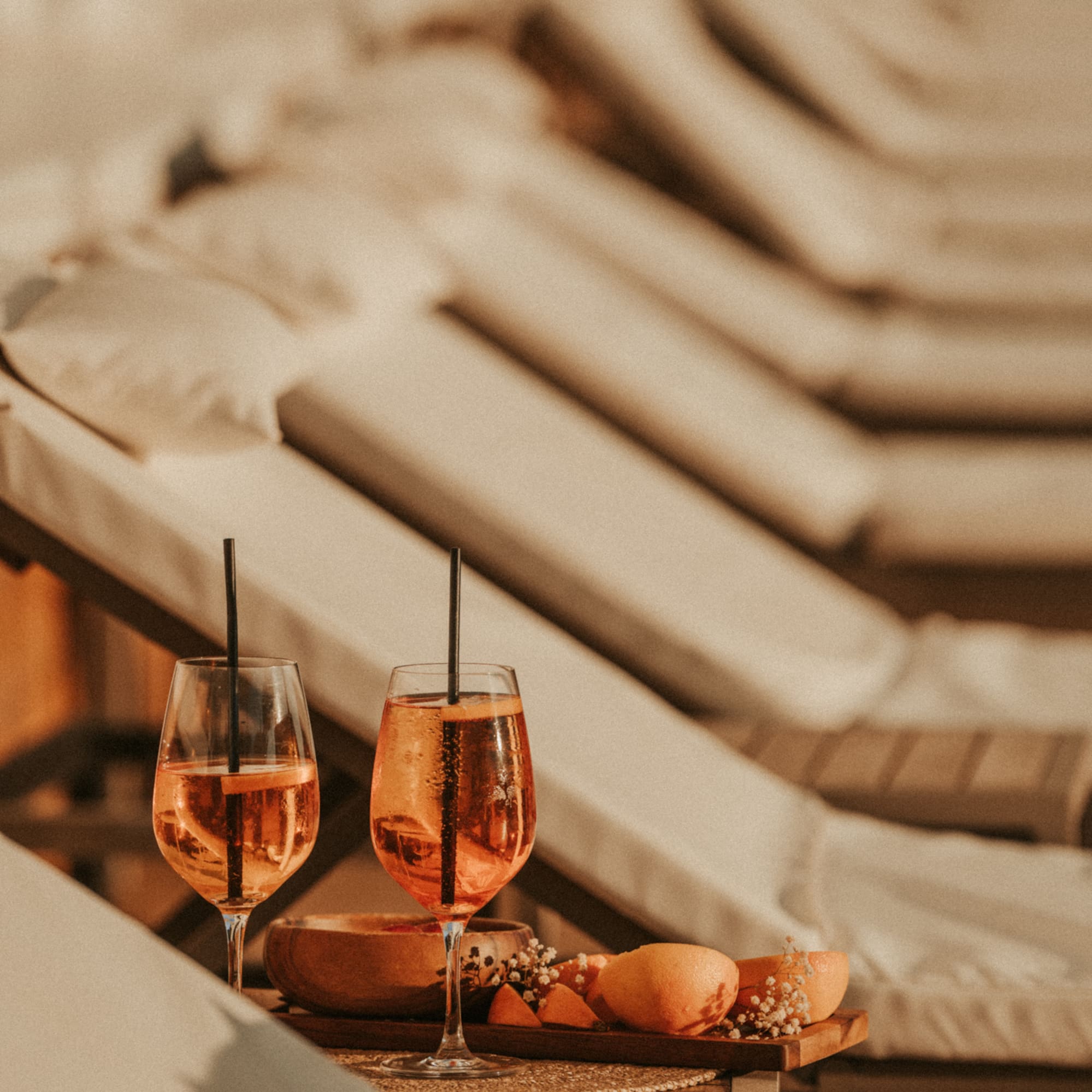 a table with drinks and fruit on it
