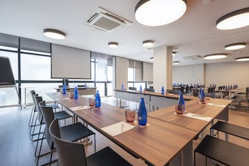 a room with tables and chairs