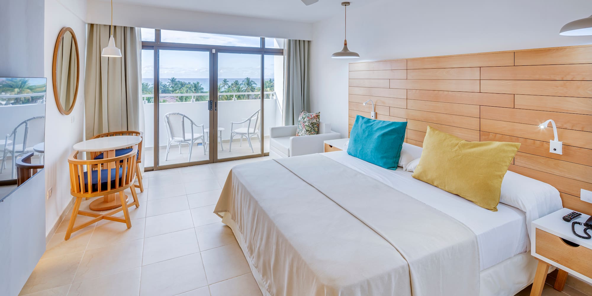 a bedroom with a bed and a ceiling fan