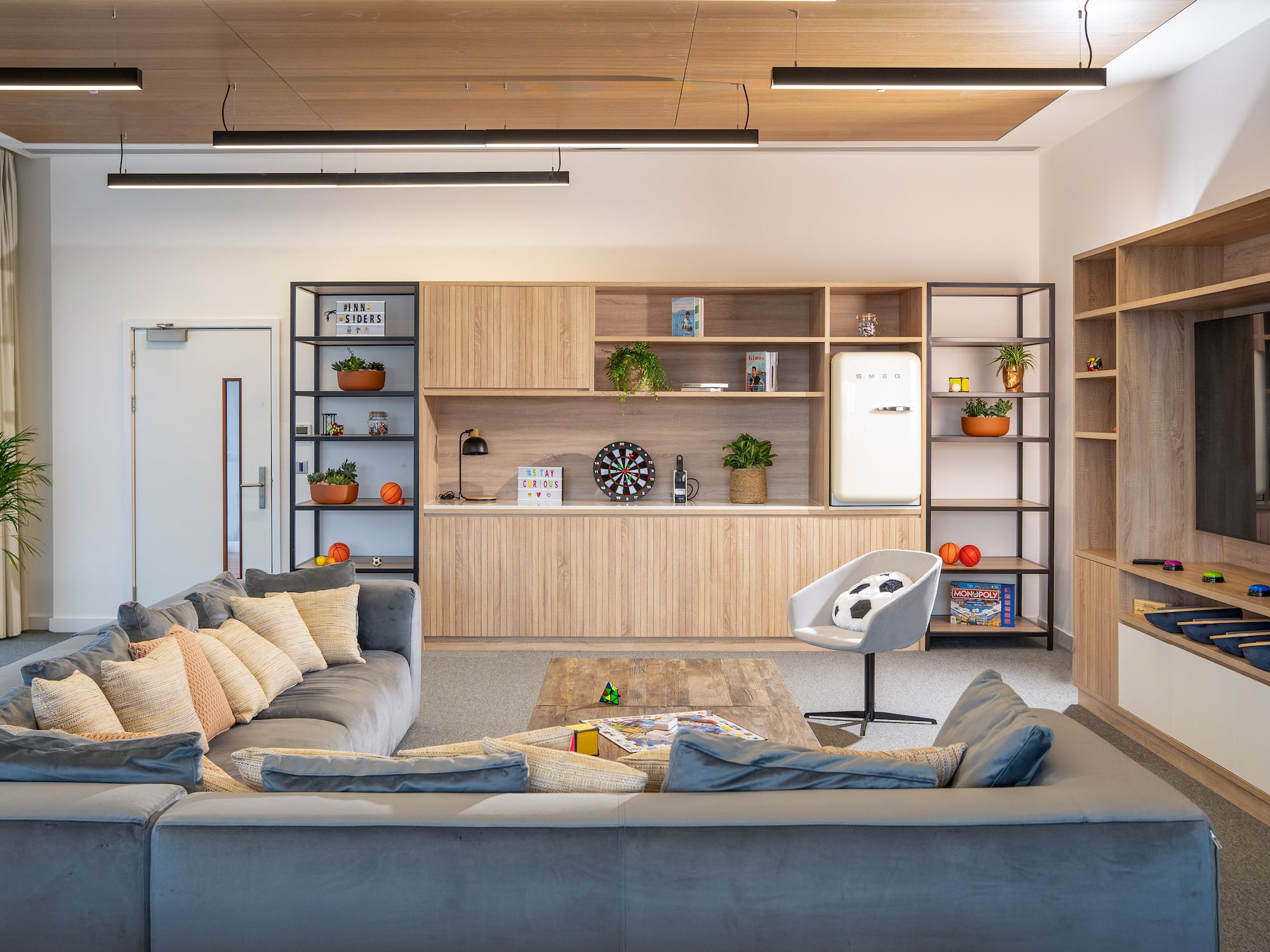 a living room with a couch and a table