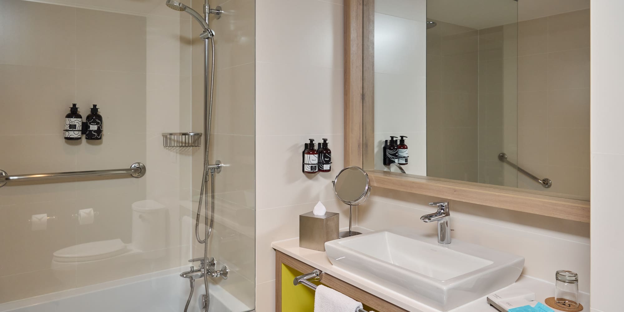 a bathroom with a shower and sink