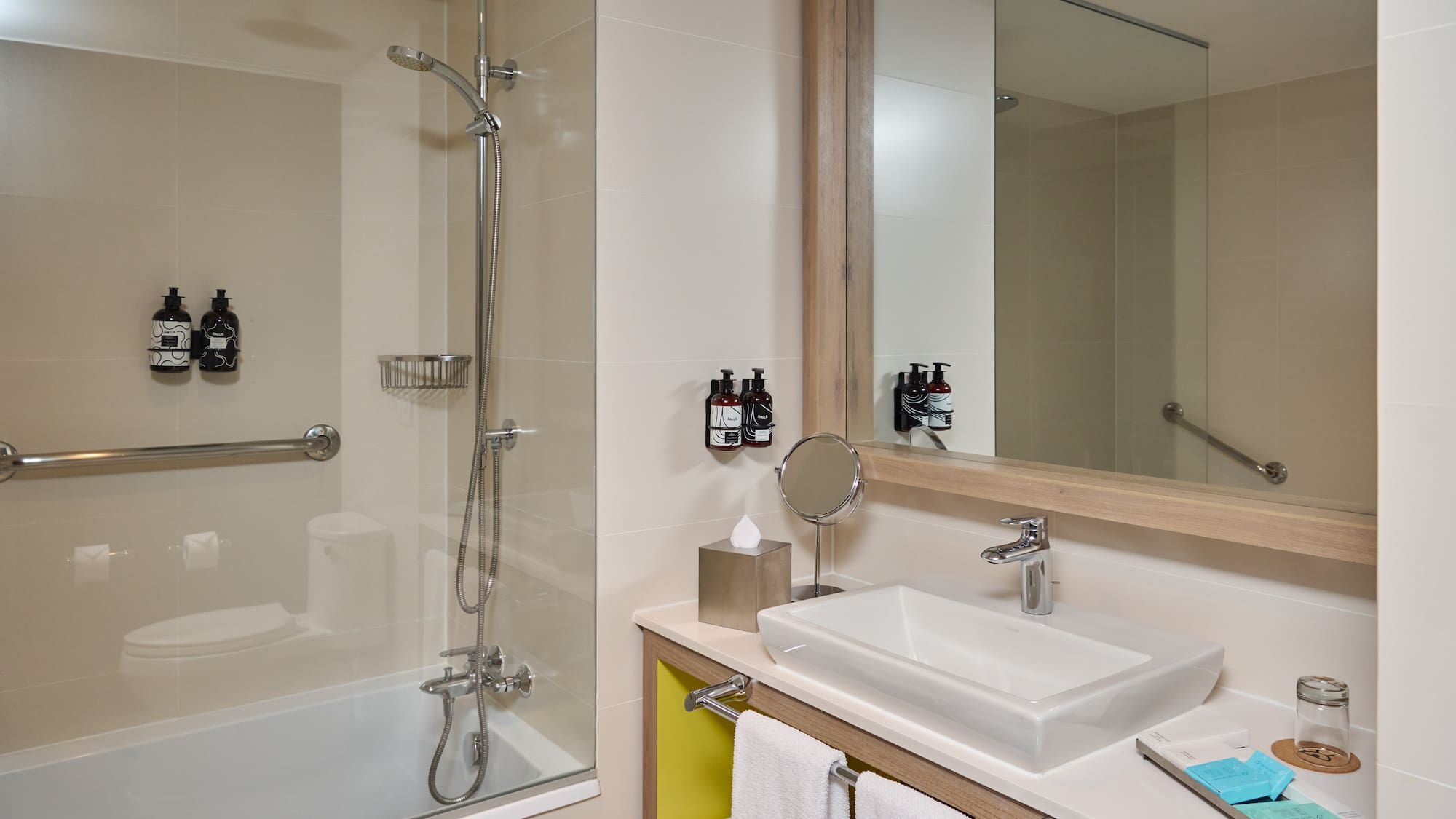 a bathroom with a shower and sink