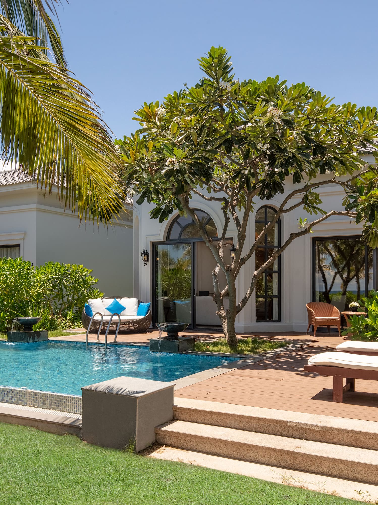 a pool in front of a house